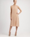Airy silk chiffon, finished with a delicate collar and a prettily pleated underlay.Modified Peter Pan collarSleevelessSide bust dartsSlip dress underlay with pleated skirtBack slit with concealed closureFully linedAbout 24½ from natural waistSilkHand washMade in USA of imported fabricModel shown is 5'11 (180cm) wearing US size 4. 
