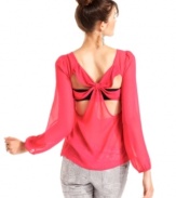 From the subtle puff sleeves to the skin-baring back cutouts -- so many reasons to love this sheer top from Ali & Kris!