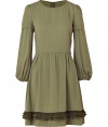 With romantic details and a ruffled trim, this Valentino R.E.D frock brings ladylike appeal to your office-to-evening style - Round neck, long sleeves with seaming details and gathering at cuffs, fitted bodice, gathered waistline, full skirt with ruffled hem, concealed back zip closure - Wear with T-strap pumps and a shoulder bag
