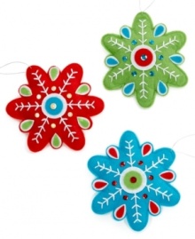 Snowed in. Snowflakes sewn in soft felt with elements of bright blue, green and red add well-crafted whimsy to your Christmas tree. Snowed in. Snowflakes sewn in soft felt with elements of bright blue, green and red add well-crafted whimsy to your Christmas tree.