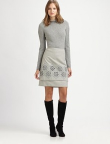 A brilliant design made from virgin wool with a hint of stretch. Its floral cutout details add a feminine touch that is beyond charming.Waist dartsSide zipperFully linedAbout 22 longVirgin wool/nylonDry cleanImported Model shown is 5'11 (180cm) wearing US size 4. 