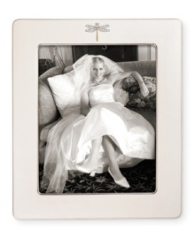 Part of the beloved collection from kate spade, this frame features a graceful dragonfly motif on fine ivory bone china. The perfect way to add a touch of fanciful whimsy to your favorite photo. Part of the beloved collection from kate spade, this frame features a graceful dragonfly motif on fine ivory bone china. The perfect way to add a touch of fanciful whimsy to your favorite photo.