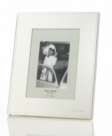 Polished to a lustrous mirror-like finish, this elegant and simple frame is crafted in silver-plated metal, making your most magical moments shine even more. With Mr. & Mrs. engraved in the bottom right corner. Polished to a lustrous mirror-like finish, this elegant and simple frame is crafted in silver-plated metal, making your most magical moments shine even more. With Mr. & Mrs. engraved in the bottom right corner.
