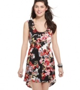 Garden party style gets a trend-right upgrade with this asymmetrical babydoll dress from Material Girl!