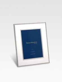 Elegant silverplate design with a beaded border and a mirror-bright shine. Outside 8¼ X 6¼ Holds 4 x 6 photo Imported Elegant silverplate design with a beaded border and a mirror-bright shine. Outside 8¼ X 6¼ Holds 4 x 6 photo Imported