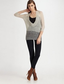 A featherweight blend of mohair and wool in an ultra-low O-neck pullover.Three-quarter sleevesRibbed trimAbout 30 from shoulder to hem67% mohair/30% polyamide/3% woolDry cleanImported