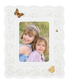 Crafted of elegant white porcelain, this Lenox picture frame combines the beloved Butterfly Meadow motif with a scalloped edge and textured accents for a look of country charm. Qualifies for Rebate Crafted of elegant white porcelain, this Lenox picture frame combines the beloved Butterfly Meadow motif with a scalloped edge and textured accents for a look of country charm. Qualifies for Rebate