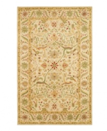 Enjoy a thousand years of rug-making tradition -- set against a soft ivory ground -- with this striking area rug from Safavieh. Tufted in India from pure wool, this rug emerges from the annals of antiquity to bring spectacular style and time-honored quality to your home. (Clearance) Enjoy a thousand years of rug-making tradition -- set against a soft ivory ground -- with this striking area rug from Safavieh. Tufted in India from pure wool, this rug emerges from the annals of antiquity to bring spectacular style and time-honored quality to your home. (Clearance)