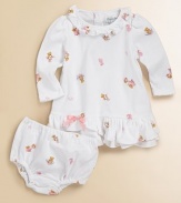 An ultra-soft, dainty ruffled dress gets a pretty update with ballerina bear print and a sweet bow.Crew neckline with rufflesLong puffed sleevesBack button closureBloomer in complementary print with elastic waist and leg openingsTwo-tiered ruffled hem with bow tieCottonMachine washImported