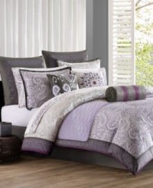 A traditional print inspired by African woven textiles wraps around this decorative pillow from Echo. A pop of purple elevates the design for contemporary bedroom décor. A traditional print inspired by African woven textiles wraps around this decorative pillow from Echo. A pop of purple elevates the design for contemporary bedroom décor.