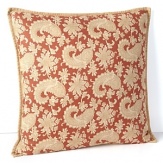 The intricate design of an antique Persian Rug in terracotta, bronze and cream tones inspires this unique Ralph Lauren decorative pillow.
