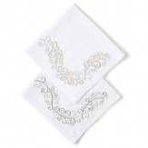 Add sophistication to any table setting with these white, gold, and silver table linens.