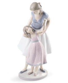 Like mother, like daughter. A lovely duo in beautifully painted porcelain, this Lladro figurine is a heartwarming memento for any family. Like mother, like daughter. A lovely duo in beautifully painted porcelain, this Lladro figurine is a heartwarming memento for any family.