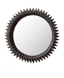 A beautiful example of the classic sun mirror, this elegant Regina Andrew design features dark zinc rays fanning out around your reflection. A beautiful example of the classic sun mirror, this elegant Regina Andrew design features dark zinc rays fanning out around your reflection.