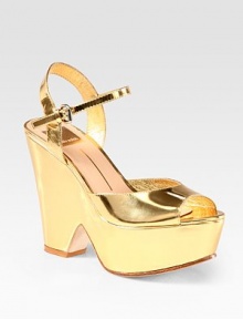 Metallic leather go-to with an adjustable ankle strap and a sensationally sculpted heel. Self-covered heel, 4½ (115mm)Covered platform, 1½ (40mm)Compares to a 3 heel (75mm)Metallic leather upperLeather lining and solePadded insoleImportedOUR FIT MODEL RECOMMENDS ordering true size. 