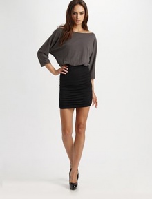 A blouson bodice and two-tone palette convey a look of effortless chic that easily dresses up for a night out on the town.BoatneckDropped shouldersThree-quarter sleevesBlouson bodiceRuched fitted skirtCenter back zipper About 24 from natural waistBodice: wool; skirt: rayonDry cleanImportedModel shown is 5'9 (175cm) wearing US size 4.