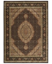 Distinctive flair with roots in Persian design. This exquisitely ornate area rug is abound in deep, striking black and beige tones, highlighted by a dramatic central medallion, and crafted from Nourison's own Opulon(tm) yarns for a densely woven pile with long-lasting color retention and durability. Distinctive flair with roots in Persian design. This exquisitely ornate area rug is abound in deep, striking black and beige tones, highlighted by a dramatic central medallion, and crafted from Nourison's own Opulon(tm) yarns for a densely woven pile with long-lasting color retention and durability.