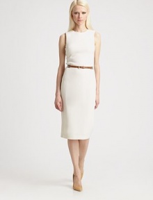 Both timeless and modern, this chic crepe design features a slender leather belt woven through metal grommets at the waist.Jewel necklineSleevelessMetal grommets at waistIncluded leather beltBack ventBack zipAbout 32 from natural waist99% wool/1% spandexDry cleanMade in ItalyModel shown is 5'10 (177cm) wearing US size 4. Both timeless and modern, this chic crepe design features a slender leather belt woven through metal grommets at the waist.Jewel necklineSleevelessMetal grommets at waistIncluded leather beltBack ventBack zipAbout 32 from natural waist99% wool/1% spandexDry cleanMade in ItalyModel shown is 5'10 (177cm) wearing US size 4.