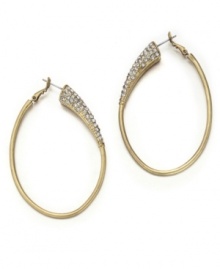 Classic gold hoops with a crystal twist. These glamorous earrings by Jessica Simpson feature clear crystal accents set in worn gold tone mixed metal. Approximate drop: 2-1/2 inches. Classic gold hoops with a crystal twist. These glamorous earrings by Jessica Simpson feature clear crystal accents set in worn gold tone mixed metal. Approximate drop: 2-1/2 inches.