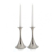 In the designer's own words, the Molten collection is distinguished by streamlined, timeless shapes... objects which reverberate with the skill of their maker and yet do not fit into a traditional interpretation of craft. The pieces possess a soulfulness and organic energy only possible through the handmade process.