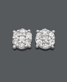 A modern twist on the traditional diamond earring. Seven, round-cut diamonds (1/10 ct. t.w.) cluster together to look like one in these stunning stud earrings. Crafted in 14k white gold. Approximate diameter: 4 mm. A modern twist on the traditional diamond earring. Seven, round-cut diamonds (1/10 ct. t.w.) cluster together to look like one in these stunning stud earrings. Crafted in 14k white gold. Approximate diameter: 4 mm.