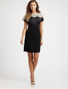 An exquisite combination of luxe silk and delicate lace gives this woven sheath a ladylike look.BoatneckShort sleevesLace embroideryConcealed back zipperAbout 22 from natural waistSilkDry cleanImported Model shown is 5'10 (177cm) wearing US size 4.This style runs large. We recommend ordering one size down for a standard fit. 