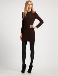 Sturdy, ultra-flattering stretch knit, accented with chic leather shoulder details.Jewel necklineLong sleevesLeather shoulder patchesBanded hemlineConcealed back zipAbout 17½ from natural waist65% rayon/30% nylon/5% spandexDry cleanMade in USA of imported fabricOUR FIT MODEL RECOMMENDS ordering true size. Sturdy, ultra-flattering stretch knit, accented with chic leather shoulder details.Jewel necklineLong sleevesLeather shoulder patchesBanded hemlineConcealed back zipAbout 17½ from natural waist65% rayon/30% nylon/5% spandexDry cleanMade in USA of imported fabricOUR FIT MODEL RECOMMENDS ordering true size.