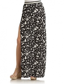 THE LOOKAllover contrasting splash printBanded waistSlits in hemTHE FITAbout 45 from waist to hemTHE MATERIALRayonFully linedCARE & ORIGINDry cleanImportedModel shown is 5'10½ (179cm) wearing US size Small. 