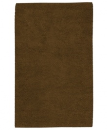 Step into ultimate softness with this opulent area rug, hand-woven with sumptuous New Zealand felted wool. In warm brown tone, this lush piece fits both traditional and contemporary decor. Step into ultimate softness with this opulent area rug, hand-woven with sumptuous New Zealand felted wool. In warm brown tone, this lush piece fits both traditional and contemporary decor.