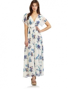 THE LOOKSweet floral print throughoutSurplice V necklineShort sleevesBanded waistCutaway front hemBack zipperTHE FITAbout 56½ from shoulder to hemTHE MATERIALPolyesterFully linedCARE & ORIGINDry cleanImportedModel shown is 5'11 (180cm) wearing US size 4. 