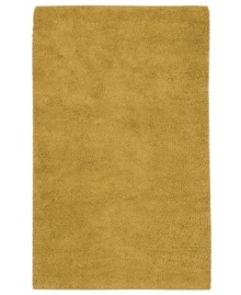 Nothing creates a warmer welcome than a rich, felted wool rug in a soothing golden hue. This luxurious piece features an undeniably soft hand, created with the finest hand-woven New Zealand wool. Nothing creates a warmer welcome than a rich, felted wool rug in a soothing golden hue. This luxurious piece features an undeniably soft hand, created with the finest hand-woven New Zealand wool.