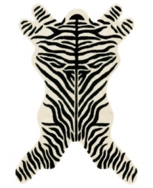 Add a lively accent to your decor, without making it wild. In eye-catching shades of black and white, this fun piece features a classic zebra-print design. Woven from plush New Zealand wool for remarkable softness and durability. Add a lively accent to your decor, without making it wild. In eye-catching shades of black and white, this fun piece features a classic zebra-print design. Woven from plush New Zealand wool for remarkable softness and durability.