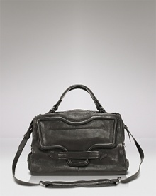 Indulge in this luxurious satchel from Kooba with a vintage, lived-in feel. It features a versatile top handle design and flap pocket with cool, textured detailing.