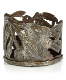 Cut, hammered and varnished by artist Michaelson, this metal candle holder accompanies flickering candlelight with intricate birds and branches. Steel from recycled barrels gives each one-of-a-kind piece a rustic beauty perfected by Haiti's esteemed artisans. Cut, hammered and varnished by artist Michaelson, this metal candle holder accompanies flickering candlelight with intricate birds and branches. Steel from recycled barrels gives each one-of-a-kind piece a rustic beauty perfected by Haiti's esteemed artisans.