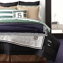 A classic channel-stitched, sleeping bag inspired comforter, rendered in a soft filled and quilted design for an extra plush feel and authentic look. A classic channel-stitched, sleeping bag inspired comforter, rendered in a soft filled and quilted design for an extra plush feel and authentic look.