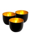 Three beacons of light for tables, shelves or window sills, the Mambrino votive cups from Design ideas suffuse any space with the warm glow of gold.