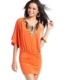 The perfect union of casual design and eye-popping detail, this blouson-style dress from Baby Phat totally glams a girl up thanks to the neckline dripping in metallic beads and paillettes. The perfect union of casual design and eye-popping detail, this blouson-style dress from Baby Phat totally glams a girl up thanks to the neckline dripping in metallic beads and paillettes.