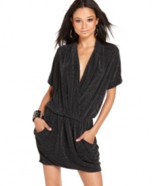 Is it hot in here or is it just this dress!? Baby Phat brings you a spicy short-sleeve dress with dramatic draping with shimmery metallic fabric. Is it hot in here or is it just this dress!? Baby Phat brings you a spicy short-sleeve dress with dramatic draping with shimmery metallic fabric.