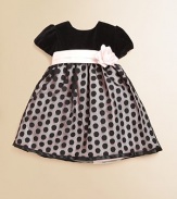 With a flower detail at the waist, gorgeous velvet and a polka-dot skirt, this pint-sized party dress is a must-have for the season.CrewneckBack button closureShort sleevesSash with flower detailTulle skirtPolyesterFully linedDry cleanMade in the USA of imported fabrics