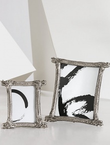 Hand-cast aluminium finished with hand-applied antiquing lends a touch of Eastern elegance to the home.AluminiumWipe clean with a soft clothImported Hand-cast aluminium finished with hand-applied antiquing lends a touch of Eastern elegance to the home.AluminiumWipe clean with a soft clothImported