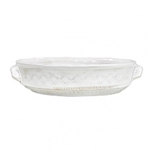 This Vietri dish was crafted by hand in Tuscany of durable, textural terra cotta for an irresistibly warm appeal. Ornament rolls are used to create its ornate designs.