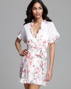 A floral print short sleeve wrapper with ruffle trim for a pretty bedtime look.