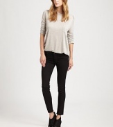 Perfect balance between modern and timeless, these highly chic skinnies have cropped-leg construction and shimmery tuxedo stripes on the sides. THE FITSkinny fitRise, about 8Inseam, about 27THE DETAILSButton closureZip flyFive-pocket style74% cotton/24% Tencel/2% LyocellDry cleanMade in USA of imported fabricModel shown is 5'10 (177cm) wearing US size 4.