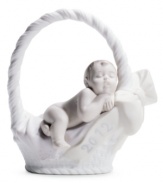 A little basket of joy. Moms and dads will cherish this beautiful Lladro figurine celebrating the birth of their baby girl in fine porcelain.