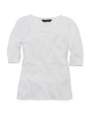 A soft ribbed cotton jersey top is updated for a pretty look with lace trim and a ribbon accent at the neckline.