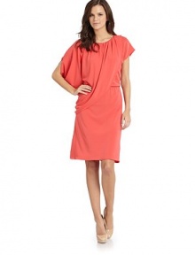 THE LOOKGathered round necklineSide draped self overlayCap sleevesElastic waistTHE FITAbout 40 from shoulder to hemTHE MATERIAL70% rayon/24% polyester/6% spandexCARE & ORIGINDry cleanImportedModel shown is 5'9½ (176cm) wearing US size Small. 
