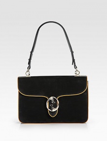 Nubuck leather with gusset construction and contrast piping and lining, finished with a double G closure.Adjustable shoulder strap with G-shaped link accents, 7¾ drop Double G closure Removable engraved logo mirror with leather case Inside zip, snap, and open pockets Leather lining 10¼W X 7H X 2½D Made in Italy