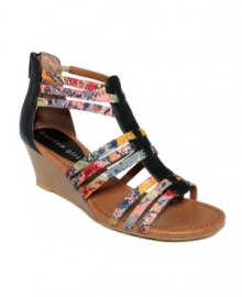 Packed schedule? Keep it cute as you get it all done. Madden Girl's Bizzy sandals feature colorful fabric straps, a trendy back zipper and a contrasting walkable wedge. Packed schedule? Keep it cute as you get it all done. Madden Girl's Bizzy sandals feature colorful fabric straps, a trendy back zipper and a contrasting walkable wedge.