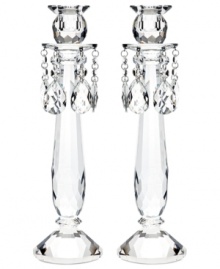 Truly stunning, Old Vienna candlesticks bring the opulence of ages past to today's most elegant interiors. A faceted crystal base and glistening crystal beads will become the focal point of any setting. From Lighting by Design. Truly stunning, Old Vienna candlesticks bring the opulence of ages past to today's most elegant interiors. A faceted crystal base and glistening crystal beads will become the focal point of any setting. From Lighting by Design.