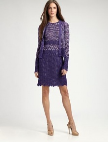 A signature zig-zag knit in an ombre-inspired pattern, enhanced with a subtle metallic sheen.V necklineButton frontLong sleevesScalloped hem and cuffsAbout 21 from shoulder to hem72% rayon/18% cupro/10% polyesterDry cleanMade in Italy of imported fabricModel shown is 5'11 (180cm) wearing US size 4. 